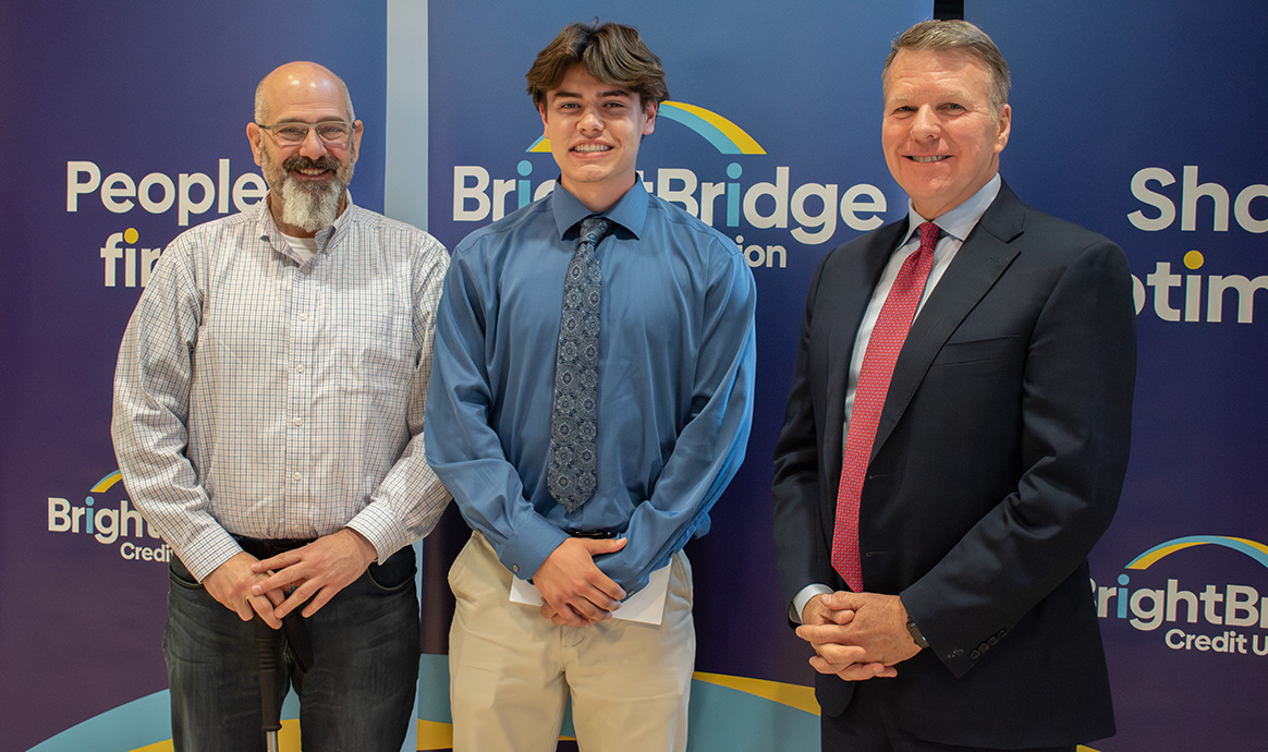 Brad Goodman, husband of Lisa Lewis Goodman, 2025 Lisa Lewis Goodman Community Spirit Award Recipient Brady Lynde, and BrightBridge President & CEO John J. Howard. 